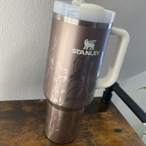 Stanley 40oz cup with laser etched design of wild iris flowers.
